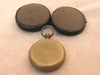 Underside view of compass & outer case